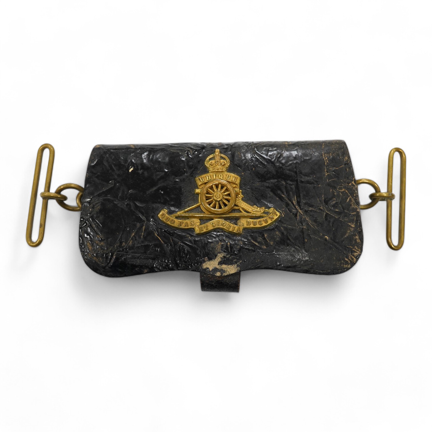 A Victorian Royal Artillery leather and brass cartridge pouch, 15cm wide. Condition - fair